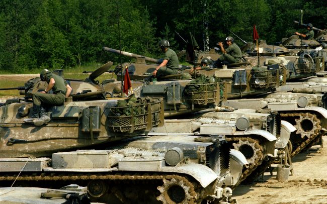 M-60 tanks, operated by members of the 157th Armor Division, are parked on the firing line during Reforger training exercises at the 7th Army Training Command. (c) LOOKSfilm